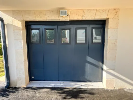 Finition imitation pierre pour encadrement de garage et porte fenêtre à Montaut, Auch, Façade Festi-Max